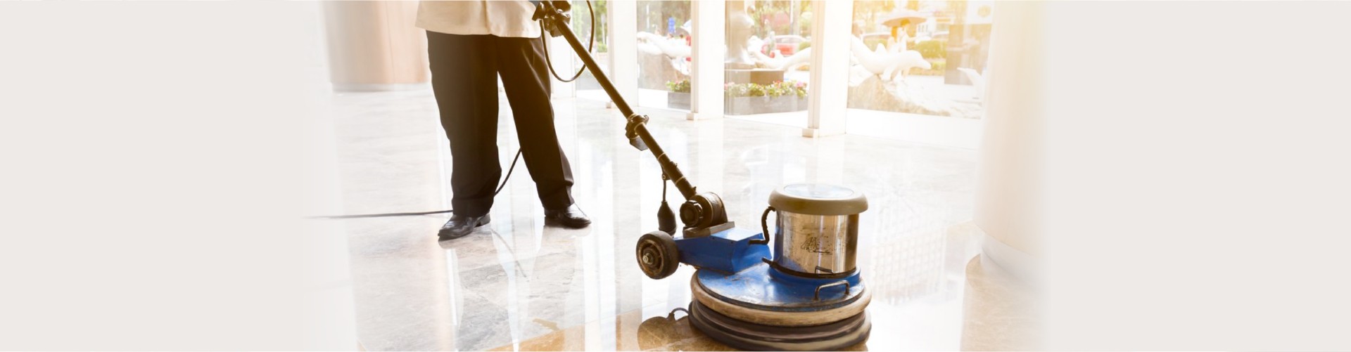 people polishes floor indoors